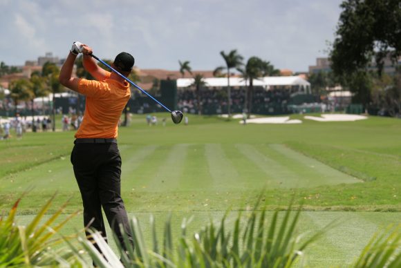 Golf player after his tee shot during a golf game