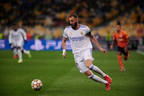 Soccer player runs the ball during a soccer game