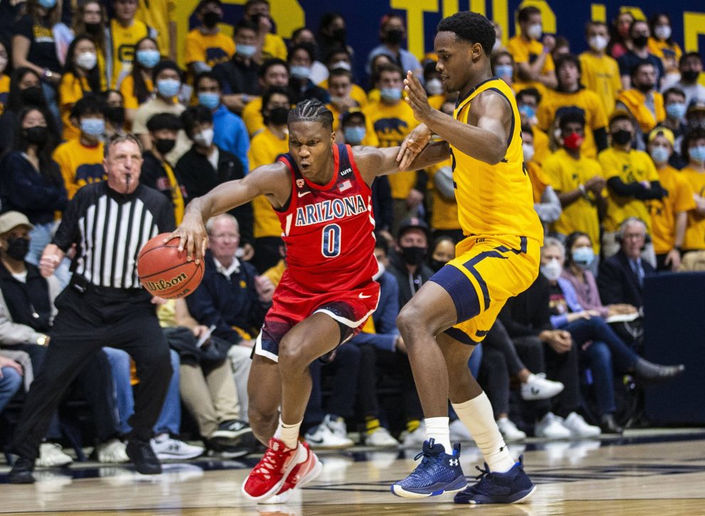 Basketball player runs the ball during a game