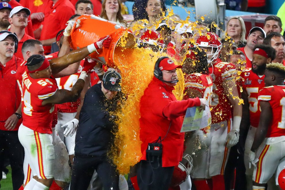 American football couch gets gatorade poured on him afer winning Super Bowl