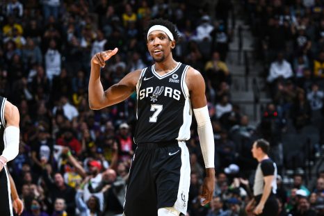 Basketball player smiles during a game