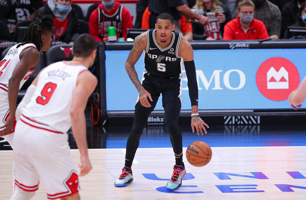 Basketball player dribbles during a game