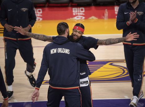 Brandon Ingram 14 of the New Orleans Pelicans is hugged by Jonas Valanciunas 17 during the presentations prior to their NBA