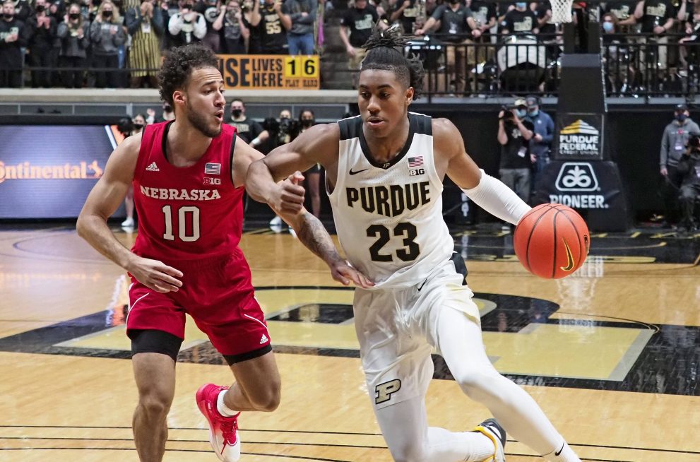 Basketball player dribbles during a match