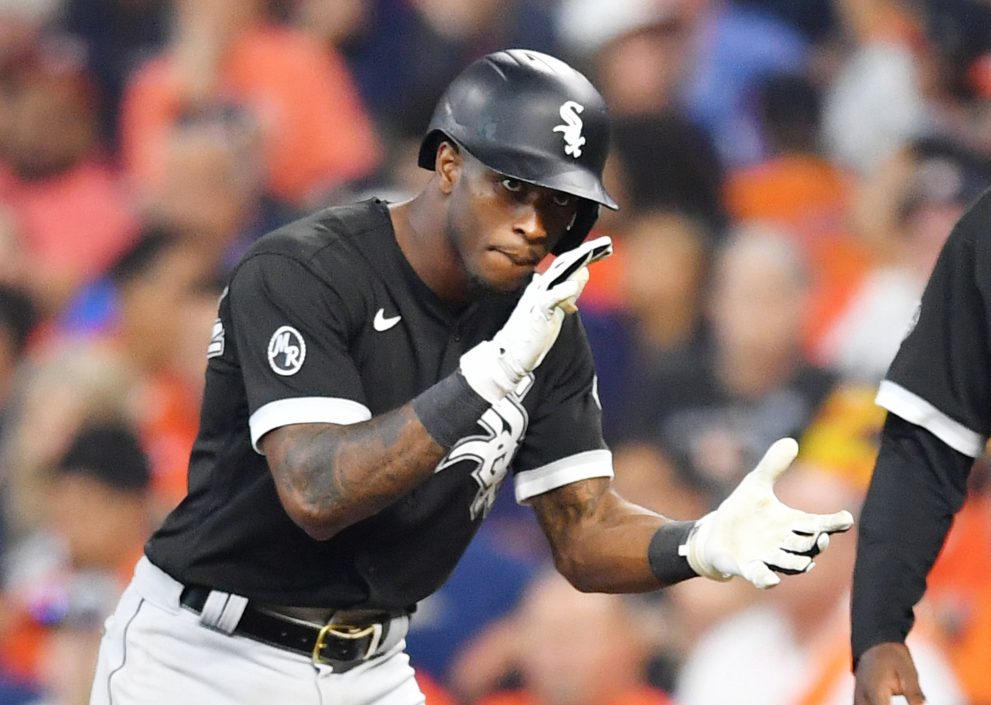 Baseball player celebrates after a hitting during a game