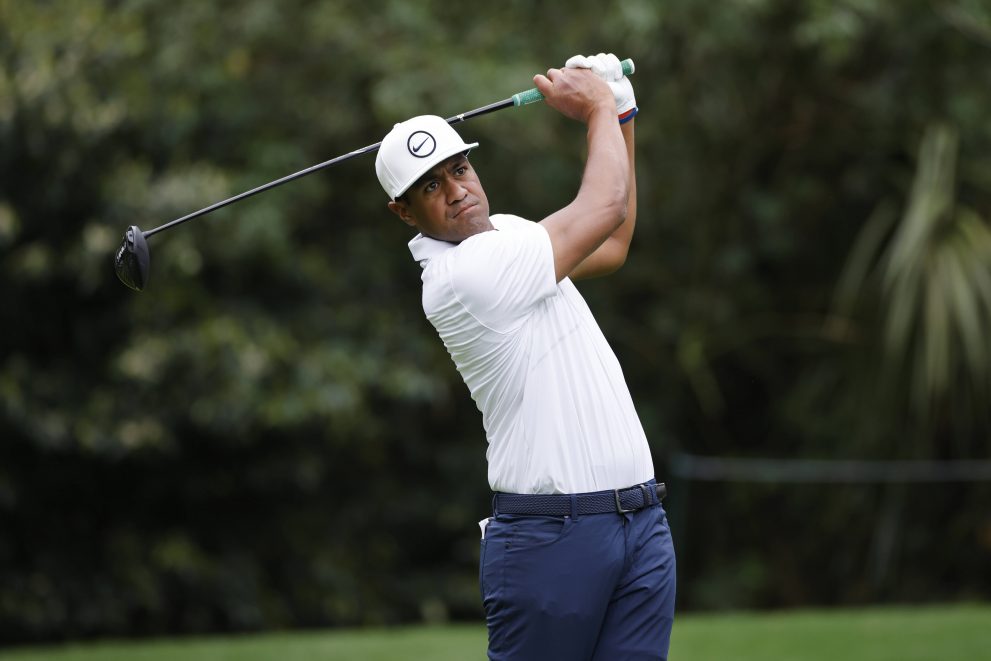 Golf player hits a drive at one of the hole during a round of a game