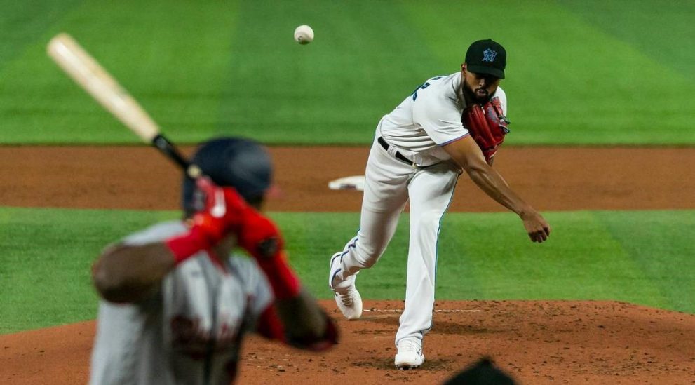 Baseball player throws the ball during a game