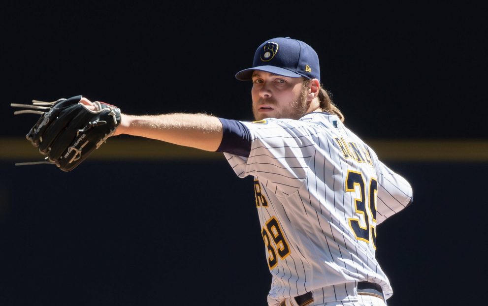 Baseball player throws the ball during a game