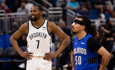Two basketball players talk after the match end