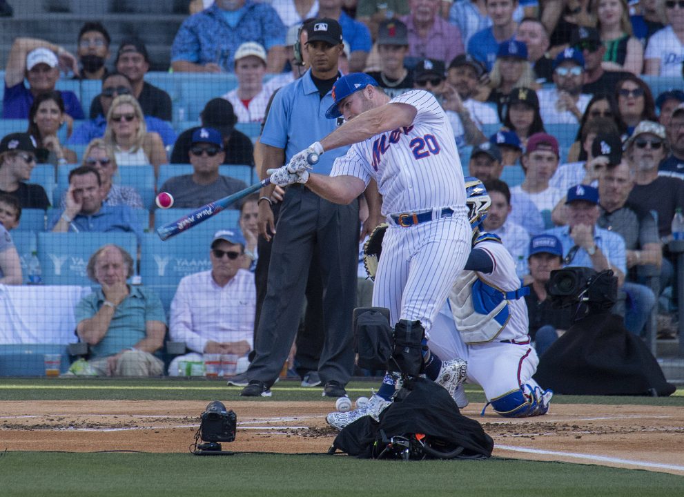 Baseball player hits the ball during a baseball game