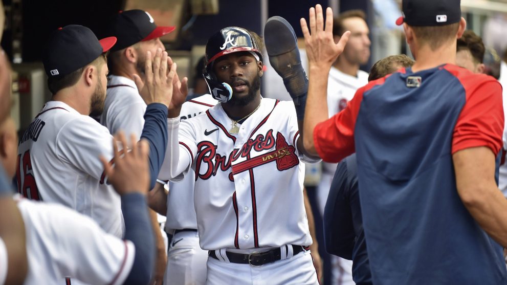 Baseball players celebrate a winning