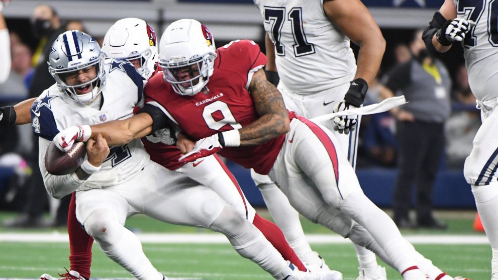 American football player scores a touch down during a match