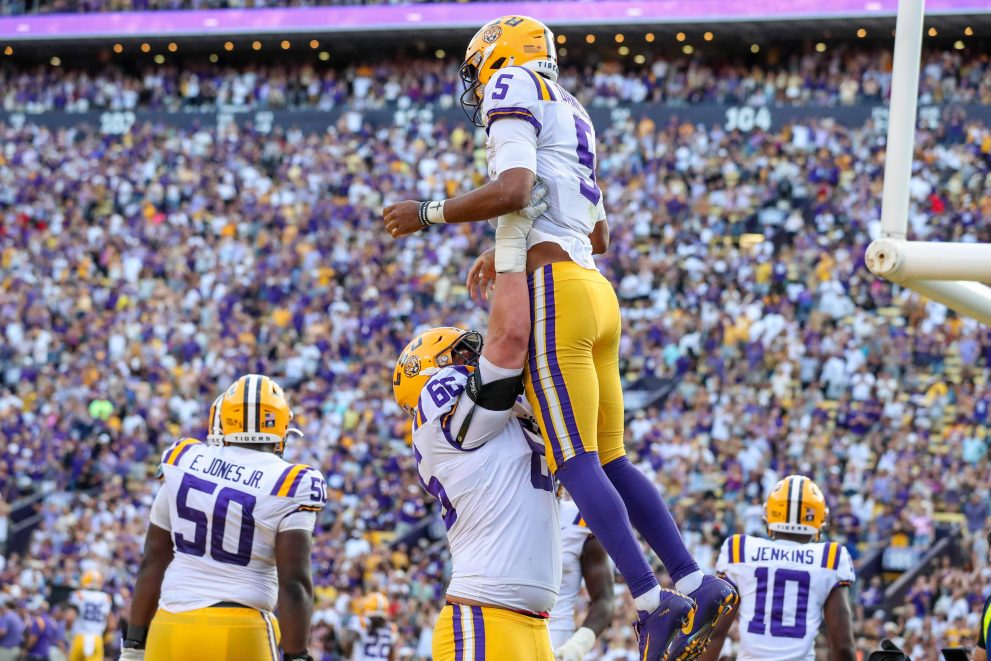 American football players celebrate a winning