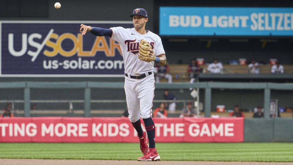 Baseball player throws the ball during a match