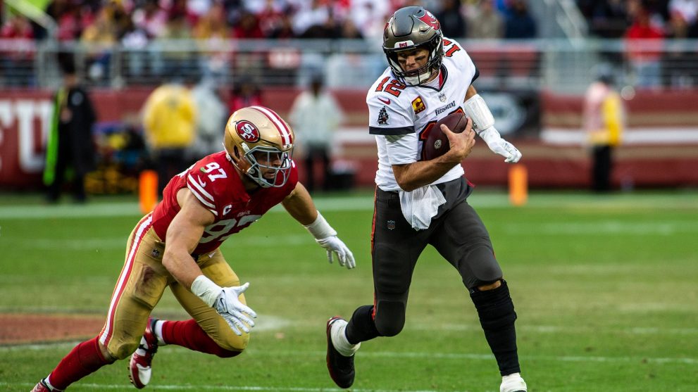 American Football player runs to a touch down during a match