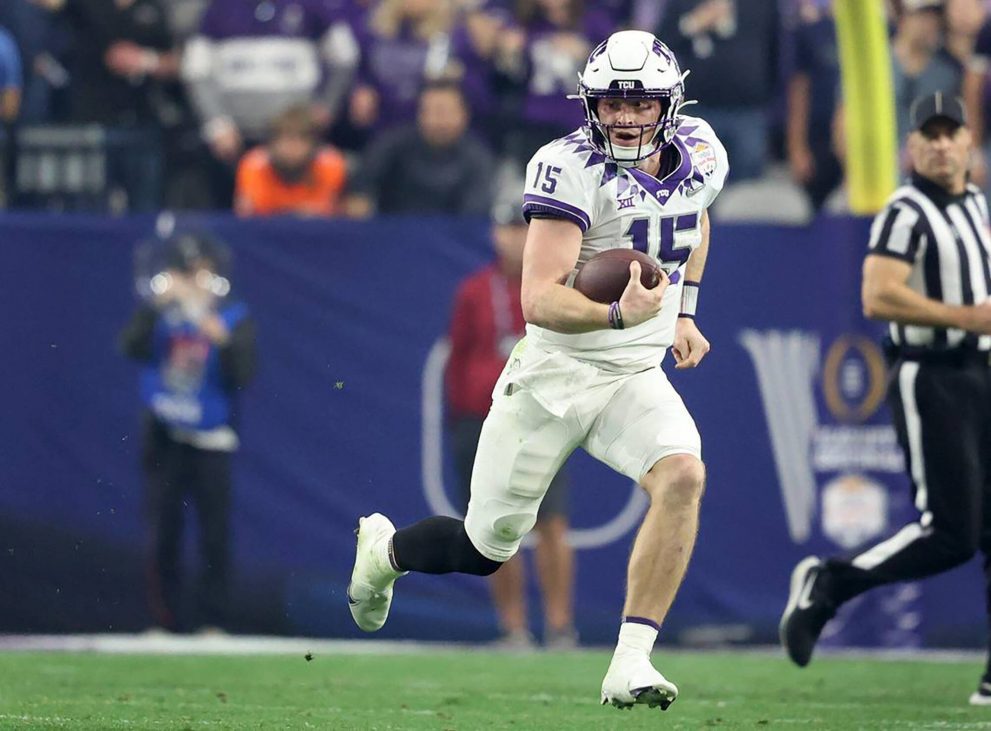 American Football player runs to a touch down during a match