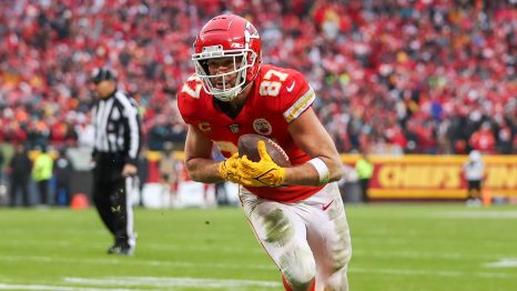 American Football player runs to a touch down during a match