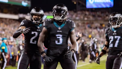 American football players celebrate a touch down during a match