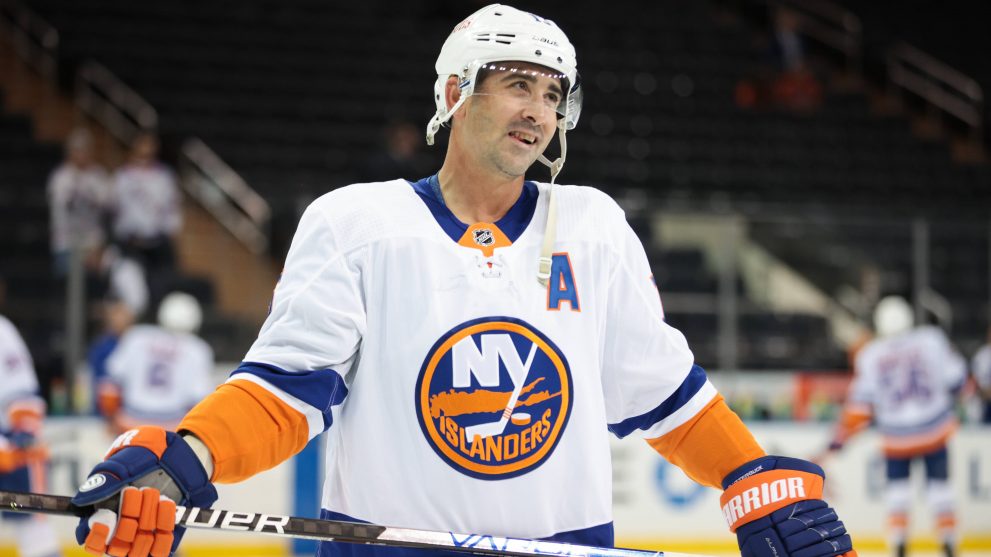 Ice Hockey player happy after scoring during a match