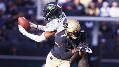 American football player catch the ball during a match