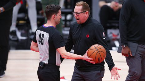 Basketball couch appeals the referee's decisions in front of him