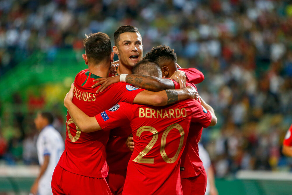 Portuguese football player celebrate after scoring