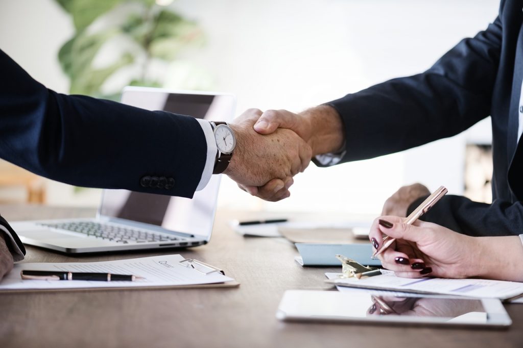 Businessmen shake hands