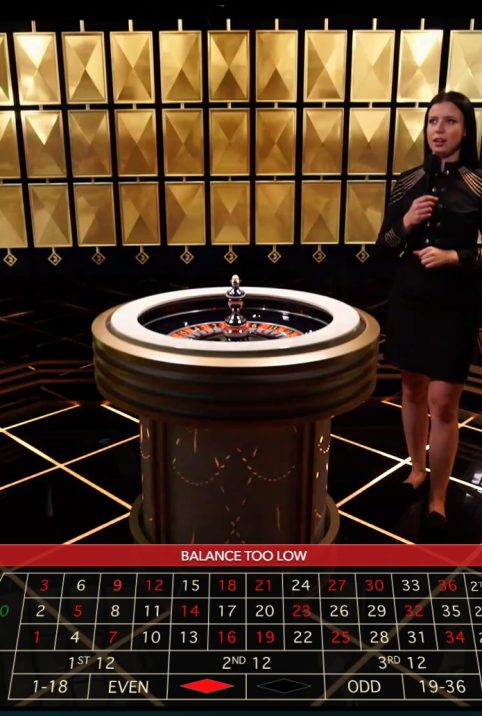 Woman in black dress makes announcements during a Lightning Roulette Game
