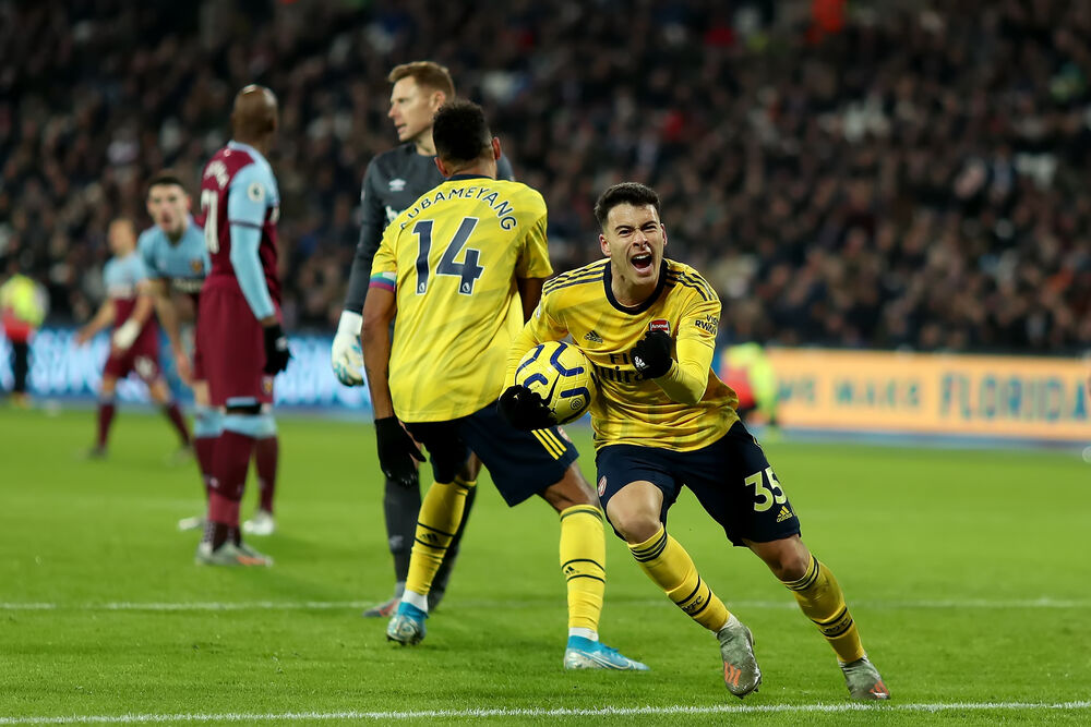 Football player celebrates after he scores during a match