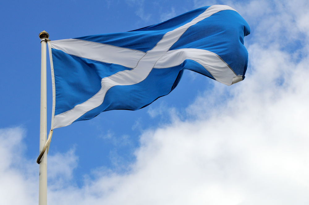 Scotland flag waves in a wind