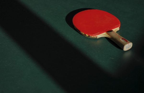 Tennis table racket on a tennis table