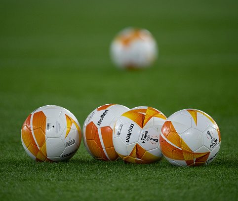 UEL footballs on pitch