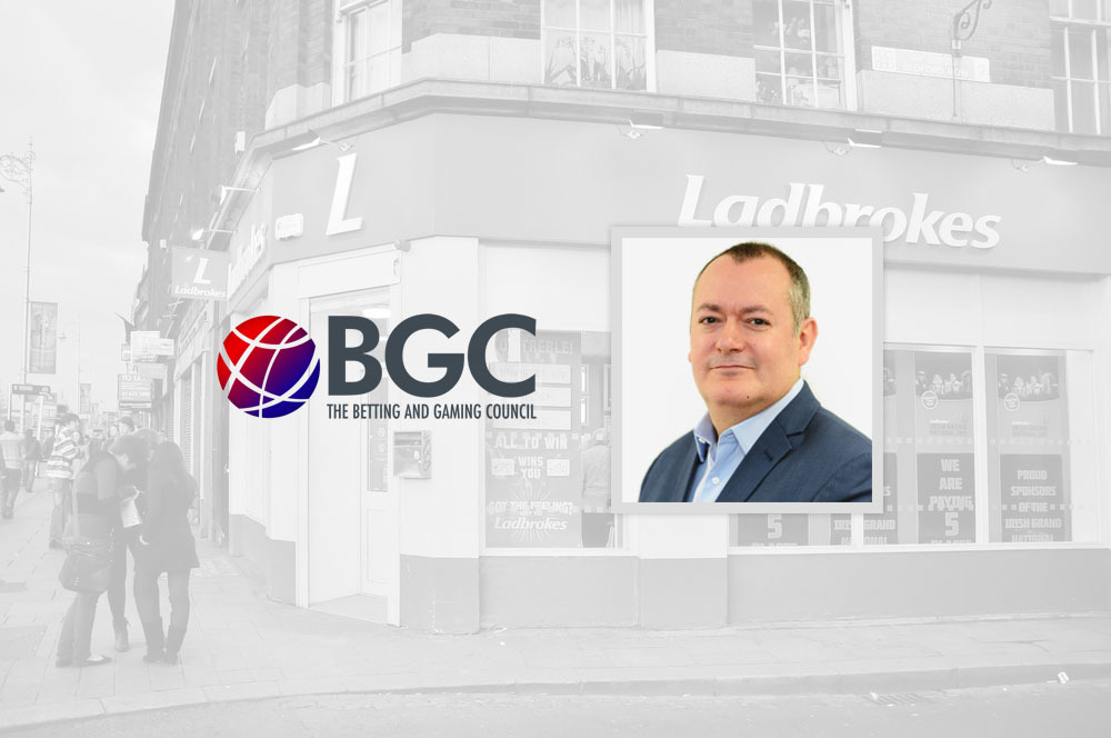The Betting and Gaming Council Logo, Michael Dugher Headshot and Ladbrokes Sportsbook in the background