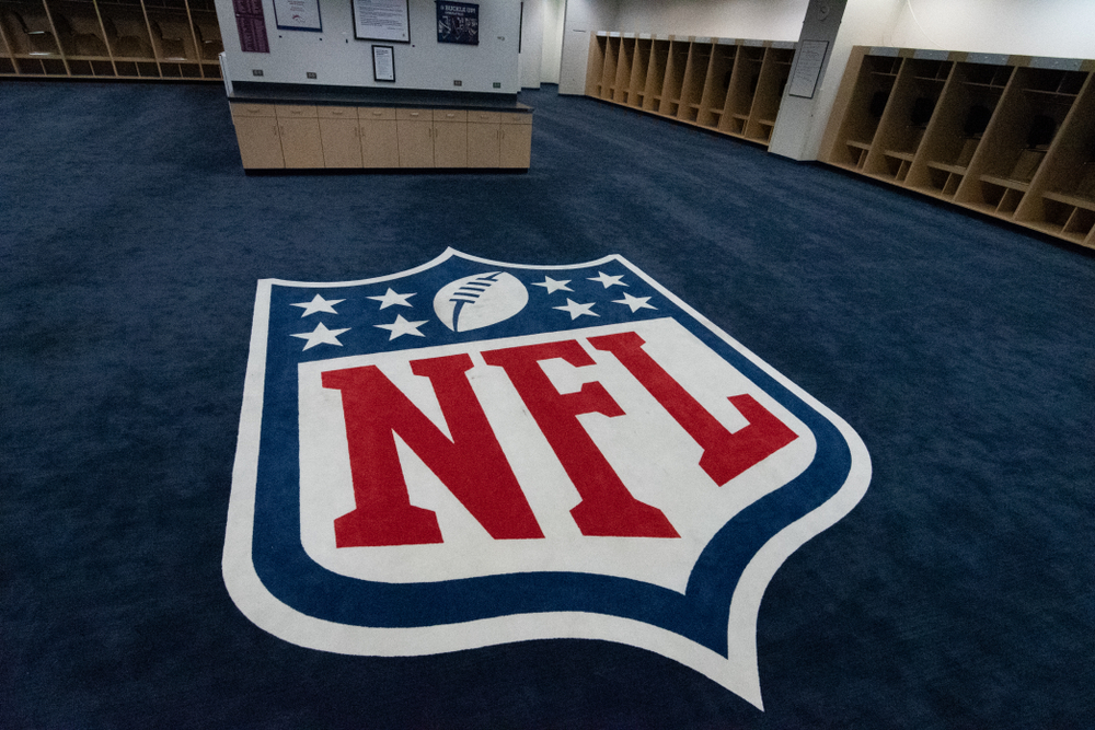 NFL logo displayed in the visitors locker room