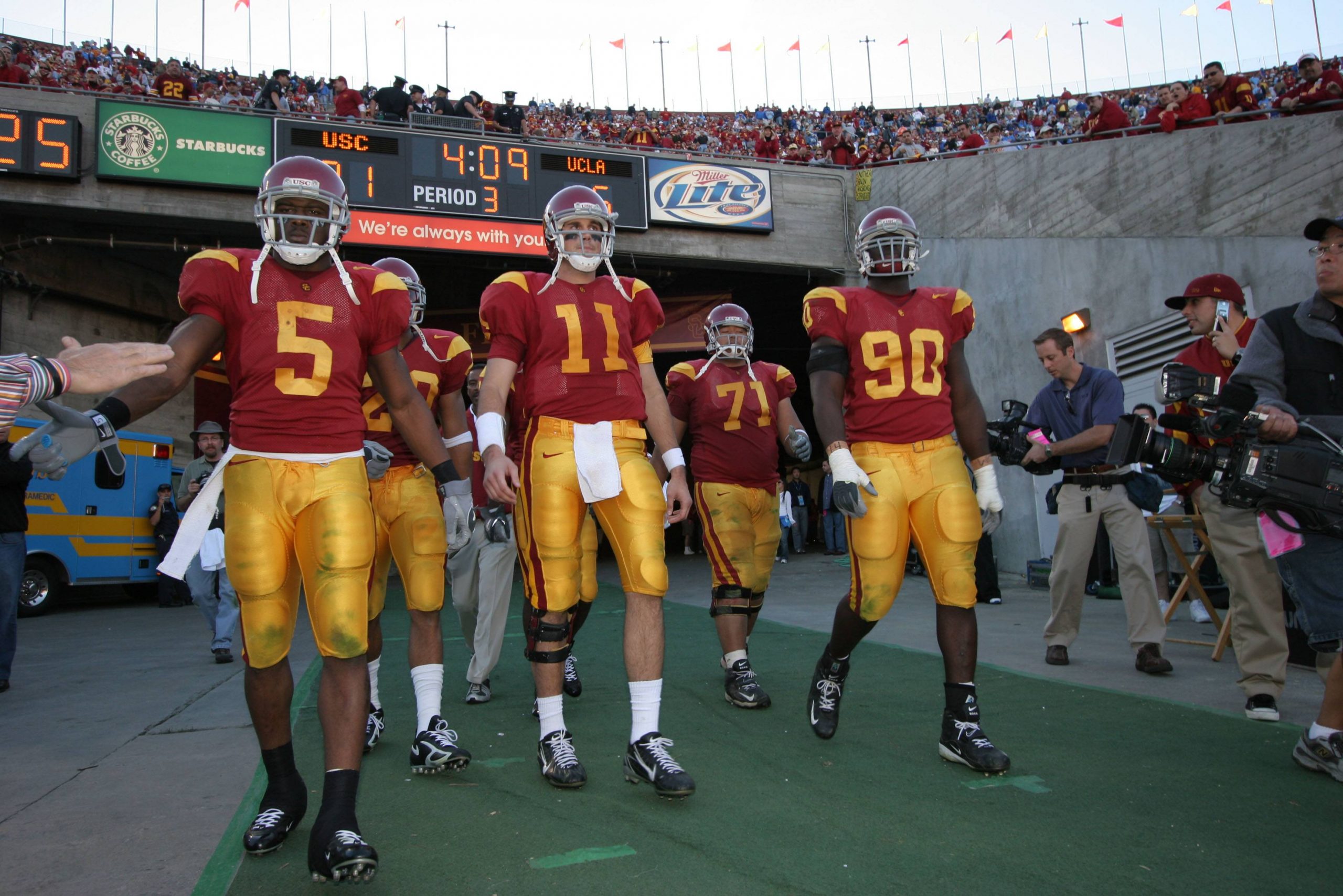 American football team leaves the stadium after a victory