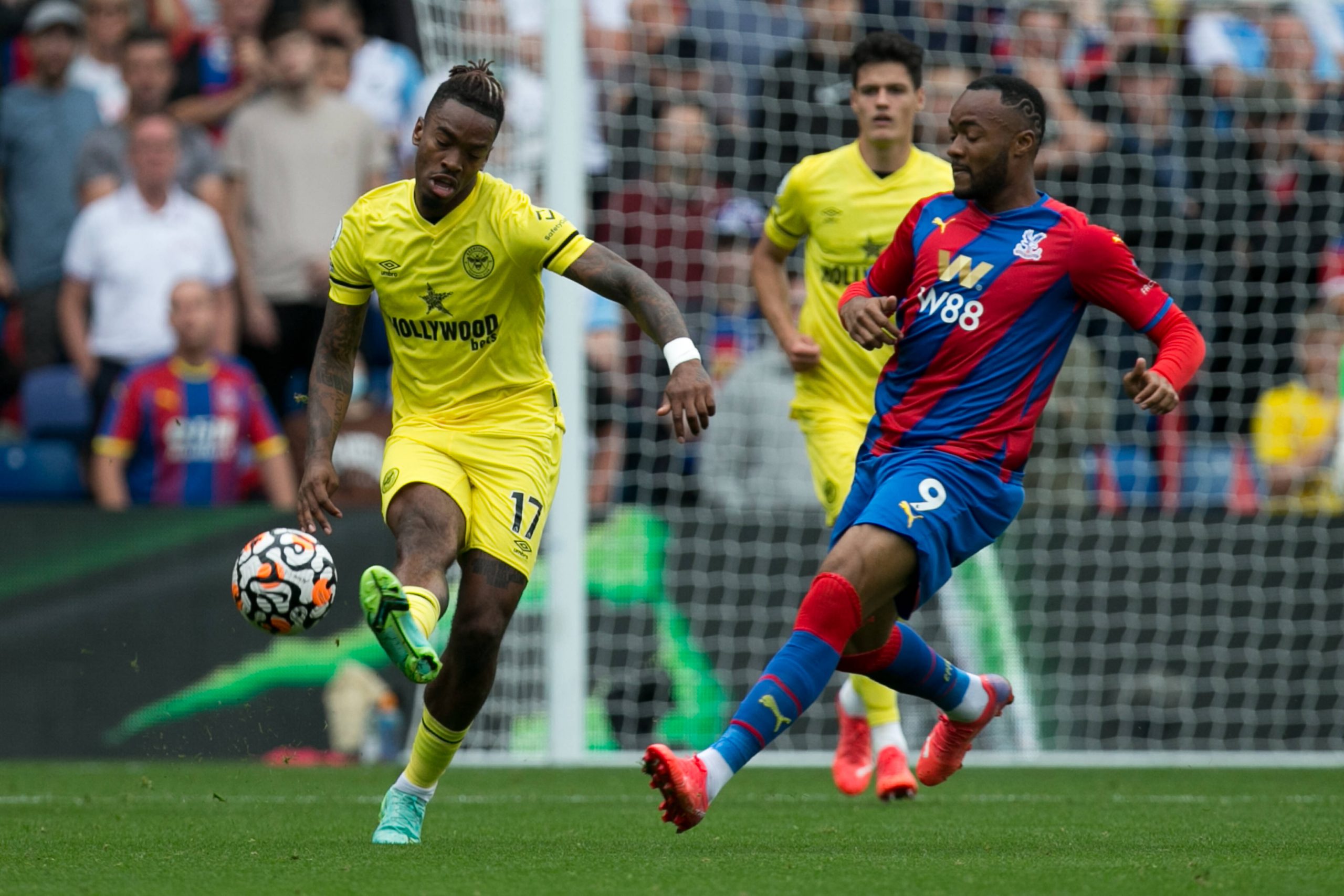 A football player controls the ball during a game