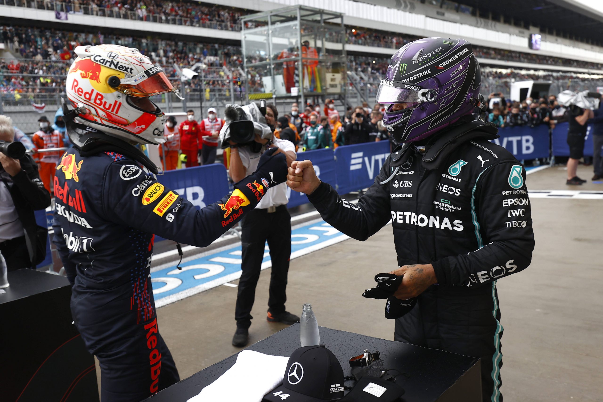 Mercedes and RedBull Formula one drivers fist bump