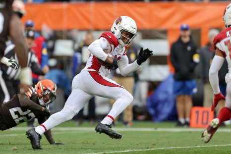 An american football player races for the end zone during a game