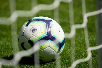 A football ball on a football ground