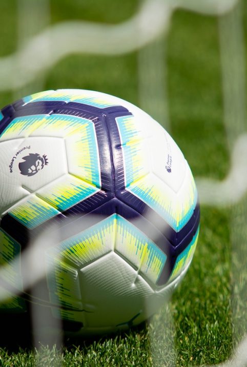 A football ball on a football ground