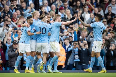Manchester City players celebrating during a football match