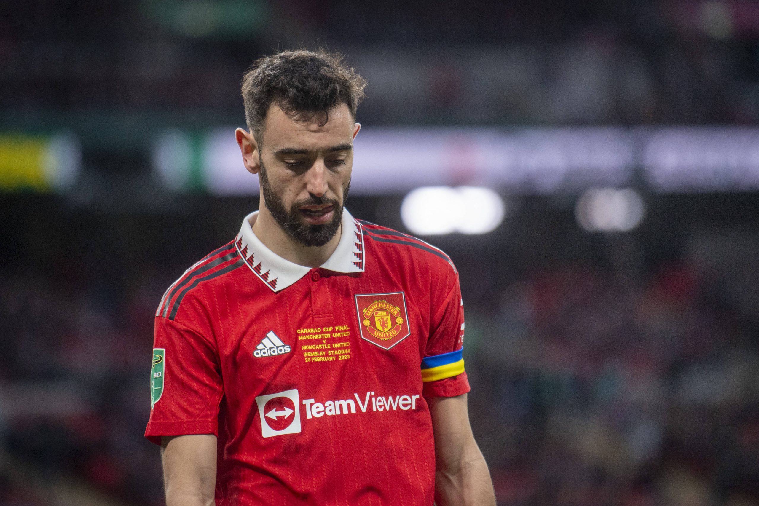 Bruno Fernandes in a Man United Shirt Looking Down